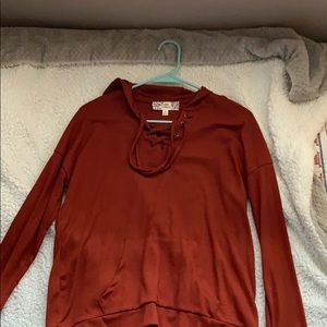 NEVERWORN long sleeve, lace up, hoodie.